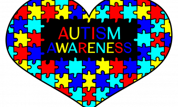 Hart van puzzelstukjes met tekst autisme
